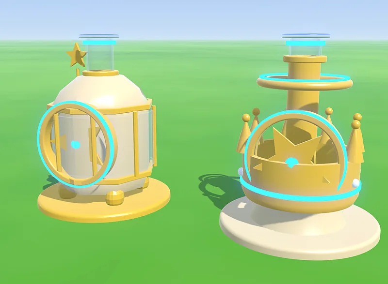 Two Celestial Crown machines in gold and cream, one shaped like a crown